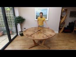 This Expanding Circular Dining Table Is Veneered In A 24 Piece Starburst Pattern In Pippy Oak The Grain Matches In Bo Circular Dining Table Table Dining Table