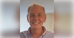 Obituary information for John T McGaughey