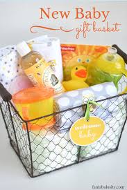 Many of our baby gift baskets, cookie bouquets, and diaper cakes also double as perfect baby shower centerpieces too. Diy New Baby Gift Basket Idea And Free Printable Fantabulosity Diy Baby Shower Gifts Diy Baby Gifts Baby Shower Gift Basket
