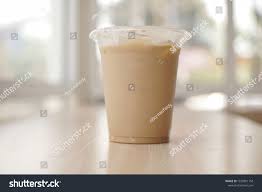 Mockup Of Iced Coffee Milk In A Plastic Cup Inside A Cafe Sponsored Spon Coffee Iced Mockup Milk In 2020 Coffee Milk Iced Coffee Plastic Cup