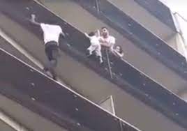 Mamoudou gassama is a hero. Paris Toddler Rescued From Balcony By Malian Migrant Mamoudou Gassama Who Scales Building Meets Emmanuel Macron Cbs News