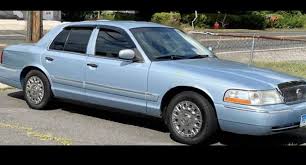 Image result for Light Ice Blue 2003 Crown Victoria