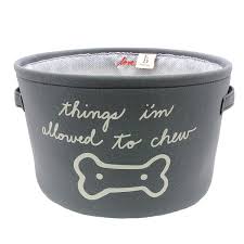 With its simple and subtle design, this storage bin fits naturally into any home. Ed By Ellen Degeneres Charcoal Dog Toy Storage Bin