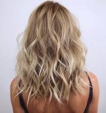 While you are drying, scrunch the ends and wrap strands around your finger to create a textured wave.2. Pin On Blonde Hairstyles