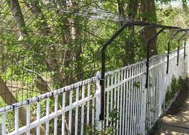 Just a simple line we bought at a feed store with a power transformer at one end. Fence Dog Extension Fence Extension Arm Dog Proof Fence Dog Fence Dog Fencing