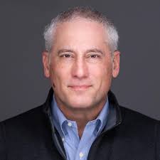 What are the benefits of being a Marriott Bonvoy Ambassador?