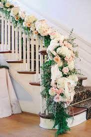 The bolder, statement flowers were next. Wedding Decorations 10 Most Beautiful Staircases Elegantweddinginvites Com Blog Garland Wedding Decor Wedding Staircase Decoration Wedding Staircase