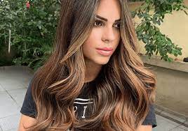 The dimension of the soft auburn against your brunette hair looks almost like the sun has kissed your hair, warming up the skin tone and giving depth to your hair. 20 Gorgeous Examples Of Illuminated Brunette Hair Color