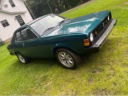 Image result for Bright Yellow 1976 Colt