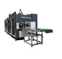 Multi-station positive and negative pressure thermoforming machine for food Packaging