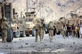 An afghan national army soldier surveying atop a humvee; Uvyazli Po Ushi Kak Ssha Proigrali Vojnu V Afganistane V Mire Politika Argumenty I Fakty