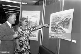 Merrill Clark , Commissioner of Canada, and Helen Griffin, a Canadian...  News Photo