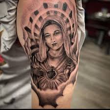 The tattoo designs are inspired by the historic blessed virgin mary paintings, sculptures, and other forms of art. Virgin Mary Tattoo 35 Tattoo Designs For Women