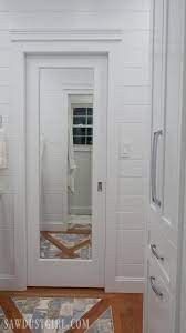 A pocket door is a sliding door that disappears into a pocket in the wall when opened, as shown in figure 1. A Mirrored Pocked Door Serves Double Duty While Taking Up No Floor Or Wall Space Slide The Mir Pocket Doors Bathroom Bathroom Remodel Master Bathrooms Remodel