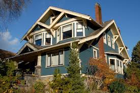 Earth tones and plenty of wood. Blue House Colors Craftsman Style Bungalow Craftsman Style Homes Exterior Paint Colors For House