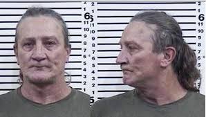 Washington man arrested and charged with murder of Morey Pelton