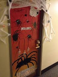 My roommate and i's dorm door decoration for halloween! Halloween Dorm Decorations Dorm Room Doors Halloween Door Decorations Room Door Decorations
