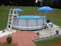 Intex Soft Side Pool Landscaped By Wrapping Black Soft Plastic Landscape Edging Around Base Fi Pool Landscaping Above Ground Pool Landscaping In Ground Pools