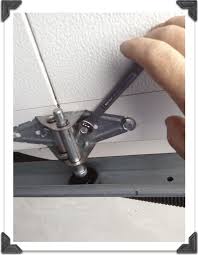 tightening garage door roller hinges garage doors garage door hinges garage door maintenance