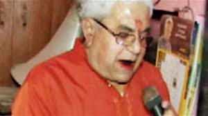 Raj Narain Mishra provides free train information by using a temple's sound  system