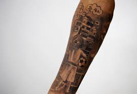 Marcus rashford profile manchester united player football lives matter soccer players mbe pool award conferred five letter fan. Rashford Has Huge Tattoo Of Young Boy Playing Football In Front Of Terraced Houses