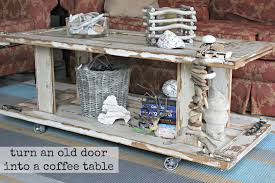 A beautiful wooden plank tops the pine bass. Old Door Upcycle How To Make A Wood Coffee Table Tutorial The Space Between Eclectic Coffee Tables Old Doors Coffee Table Wood