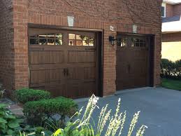 Beautiful Steel Insulated Doors With Clopay Ultra Grain Walnut Finish And Colonial Decorative Hardware Garage Doors Garage Door Styles Exterior Garage Door