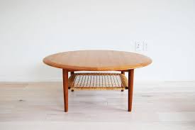 Round danish ox art ceramic and teak coffee table from trioh, 1977 for $953.00 (7/8/2021). Danish Modern Johannes Andersen Teak Round Coffee Table With Rattan Shelf By Cfc Silkeborg By Midcentury55 From Midcentury55 Of Ravenna Seattle Wa Attic