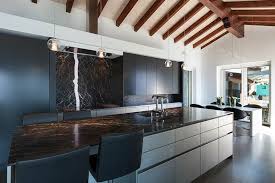 Quartz kitchen worktops offer strength and durability with great hygienic properties. White Kitchen Cabinets With Dark Countertops Designing Idea