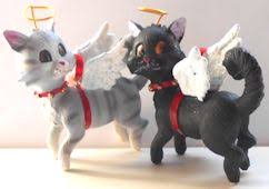 The most divine tiny one dog angels, cat angels and animal angels are one of our most popular products. Cat Angel Ornament Grey Or Black Cat
