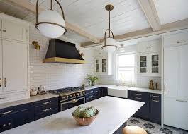Find beautiful blue kitchen ideas, including blue kitchen cabinets, blue kitchen islands. Navy Blue Shaker Cabinets With Black French Range Transitional Kitchen