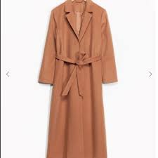 Wear this camel wrap coat over a pair of patching camel pants and brown heels for a sleek ensemble. Other Stories Jackets Coats Other Stories Long Wool Coat Camel Poshmark