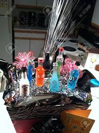 When your loved one reaches this milestone, our 21st birthday decorations and supplies are ideal to help them celebrate. 21st Birthday Gift Basket With Alcohol Bottles Stock Photo Picture And Royalty Free Image Image 21832352