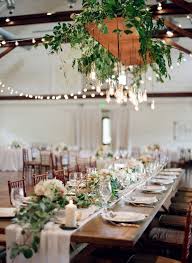 Hanging Lights And Vines To Match The Vine Table Runner For The Wedding R Outdoor Wedding Table Decorations Outdoor Wedding Tables Rustic Wedding Table Runners