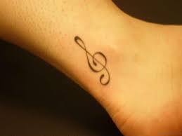 These music notes are hiding behind the ear, a very subtle tattoo. 33 Cute Music Notes Tattoos On Ankle