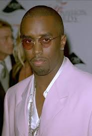 The image above is of Sean Combs also known as P.Diddy. The image is from  the style of the 1990's. The image is taken from shortlist.com. This suit  all though we can
