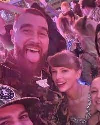 Taylor Swift and Travis Kelce at a New Year's Eve party