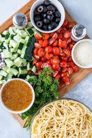 · add cherry tomatoes, red bell pepper, . Summer Spaghetti Salad With Veggies And Italian Dressing
