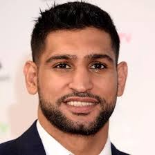 Glamour model who 'romped with Amir Khan' jailed after she stashed loaded  gun in her home