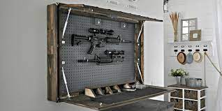 This wall mount gun rack is here to hold your for guns together in a stylish way like cbi offices. Secret Diy Gun Compartment Hides Behind A Mirror