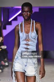 A model walks the runway at the Mark Fast fashion show during London...  News Photo