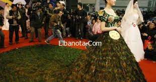 صور فستان زفاف الطاووس بـ 1 5 مليون دولار فساتين زفاف أزياء بنوته بنوته كافي expensive wedding dress most expensive wedding dress peacock wedding dresses