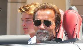 Arnold Schwarzenegger takes his son Patrick for a spin in $250,000 Mercedes 