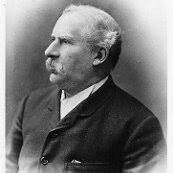 A photograph of the older General Drayson, still sporting his long...