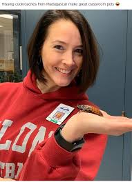 You just never know what an RCPS principal will do. Here is Dr. Amy  Painter, principal at Linville-Edom Elementary School, with a "classroom  pet."