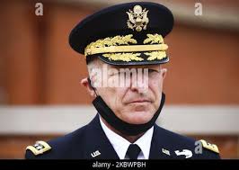 Gen. James C. McConville, Army Chief of Staff, congratulates Maj. Gen. Brian  Eifler, 11th Airborne Division commanding general, during the division's  activation ceremony June 6, 2022, at Ladd Army Airfield