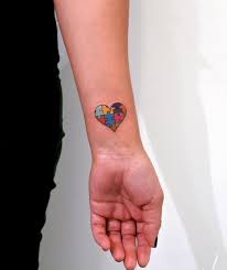Autism 3d puzzle pieces tattoo on wrist. 20 Autism Tattoo Designs Ideas Design Trends Premium Psd Vector Downloads