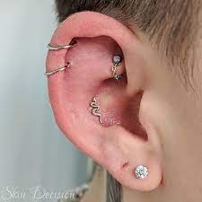 Check Out These Sweet Upgrades An Anatometalinc Chain Added To Accent A Rook Piercing By La Sorciere Verte And A Cu Conch Piercing Piercing Jewelry Piercing