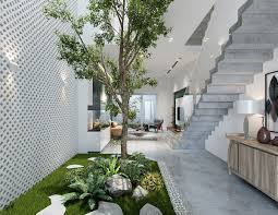 Create a cozy small courtyard in your backyard using a few cheap tricks. 4 Homes That Feature Green Spaces Inside With Courtyards Terrariums Courtyard Design Patio Interior Interior Garden