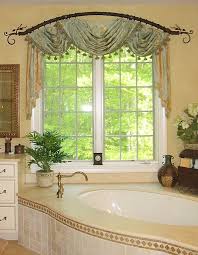 These options for hiding a bad window view will have you seeing the light in no time. Orion Designer Pride Pretty Arched Drapery Rod Metropolis Iron Can Fabricate Bathroom Window Treatments Large Window Treatments Arched Window Treatments